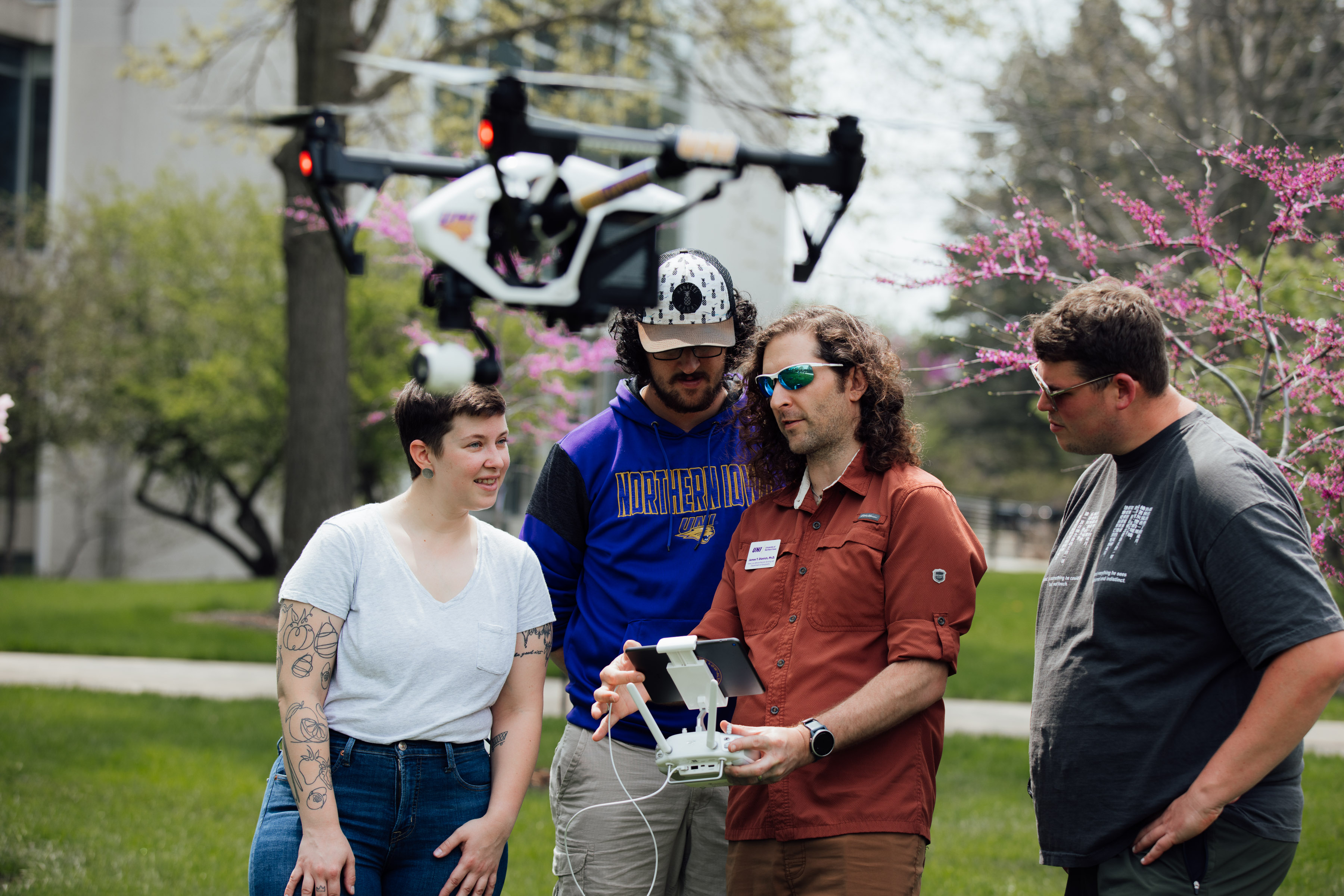 Geography students and faculty gaining experience with drones as they prepare to fly over campus.